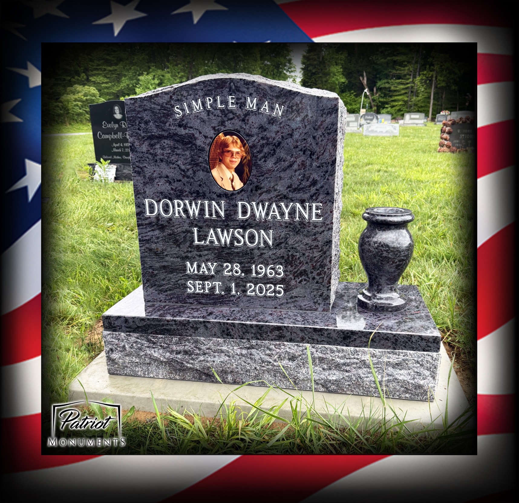 Dorwin Lawson custom granite monument with portrait medallion and patriotic border